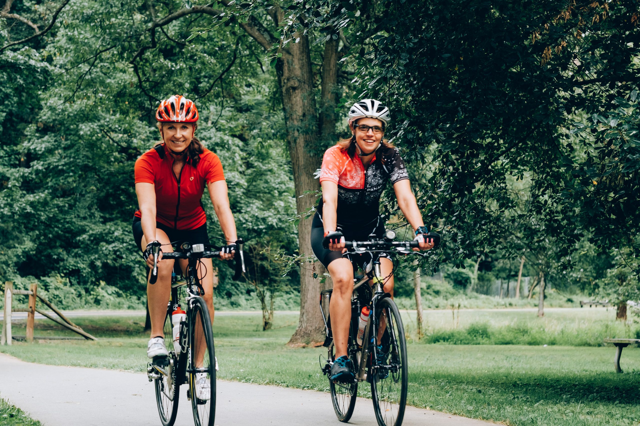 two women biking - How to Ditch Old Habits and Adopt Better Ones