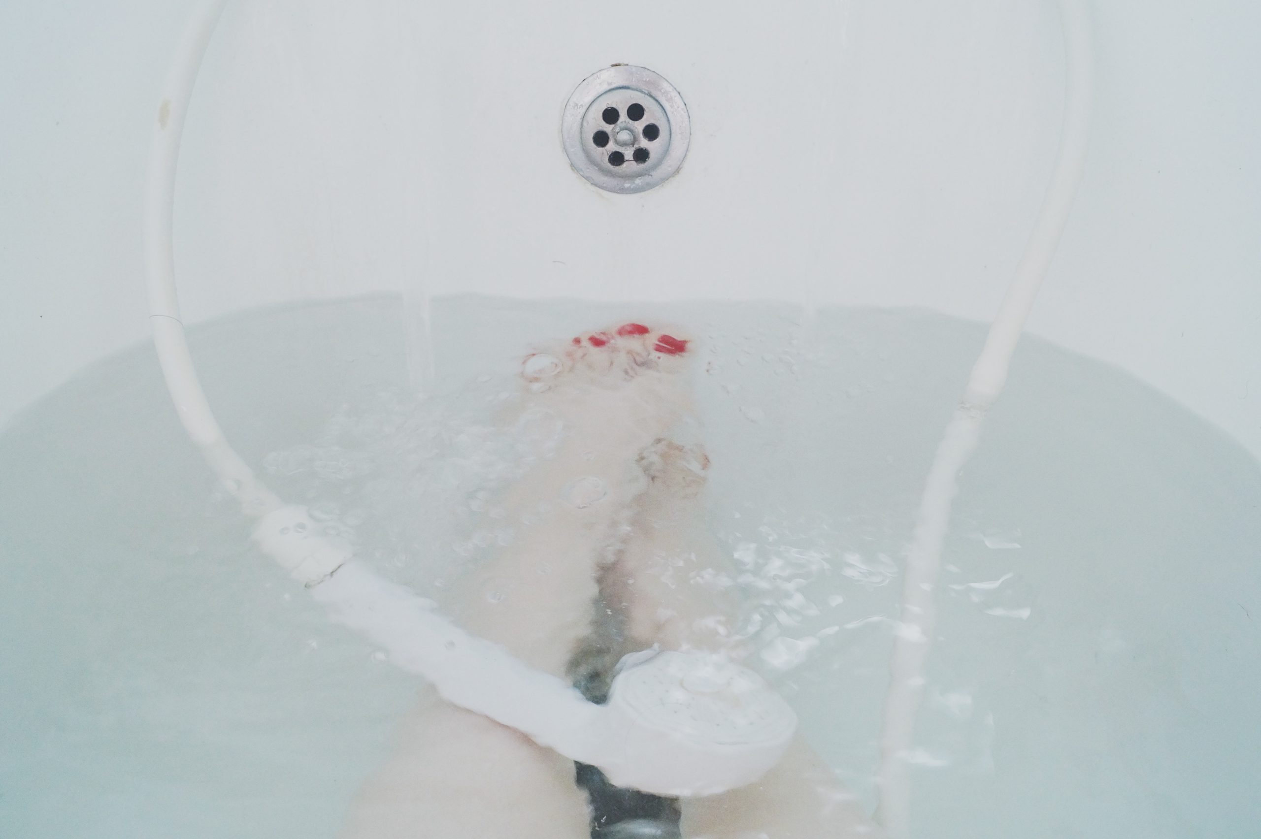 3 Habits Fit Midlife Women Use to Slay Their Day - woman taking a bath
