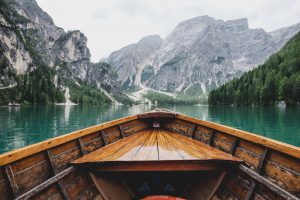 a boat in the middle of a lake. heike yates. 