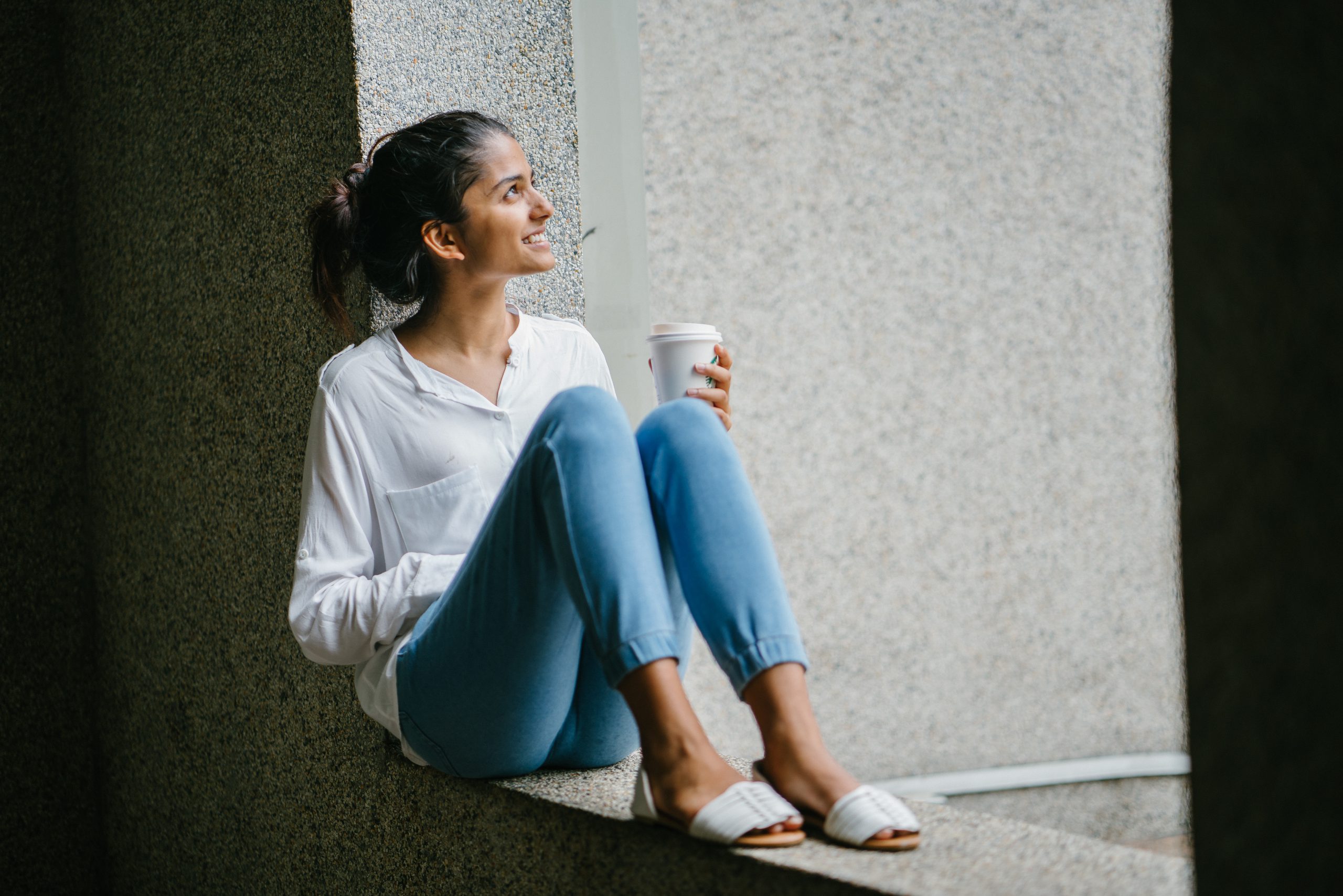 women sitting drinking coffee -3 Essential Steps To Boost Self-Confidence