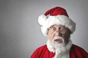 man in santa clause costume -How to Avoid Holiday Weight Gain For Good