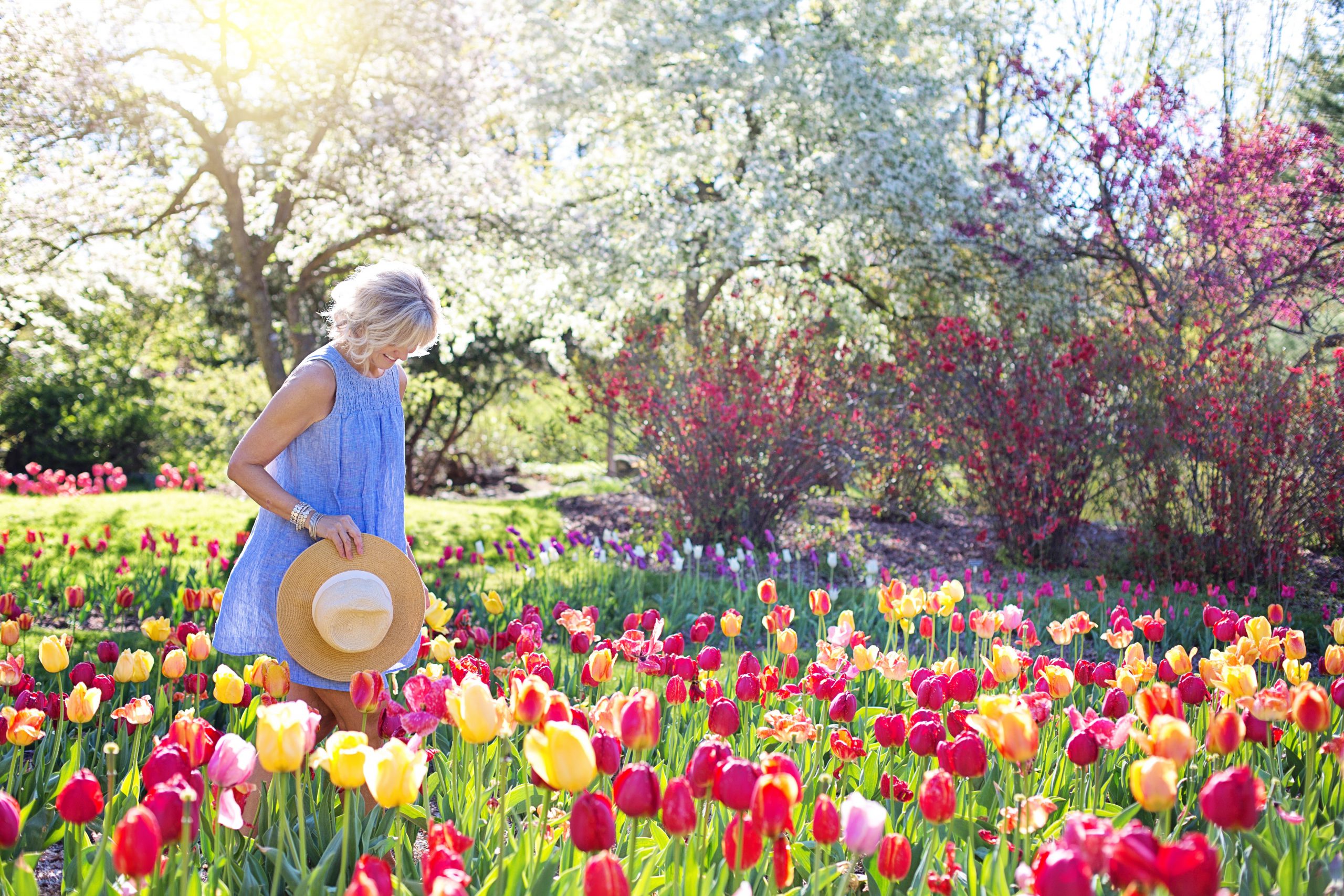 women standing in flowers - How to Ditch Old Habits and Adopt Better Ones