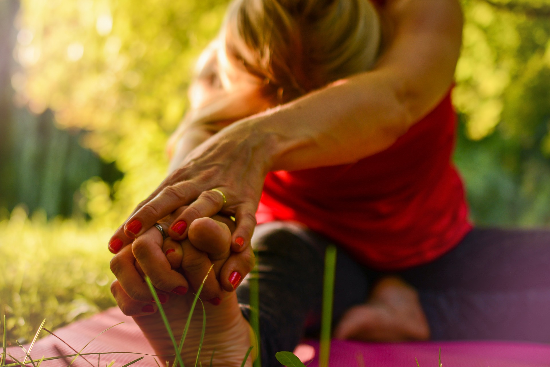woman stretching to her toes.Self-Care: The Key To A Balanced Life