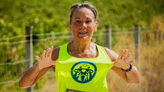 middle aged woman running - how to stay fit in midlife - heike yates