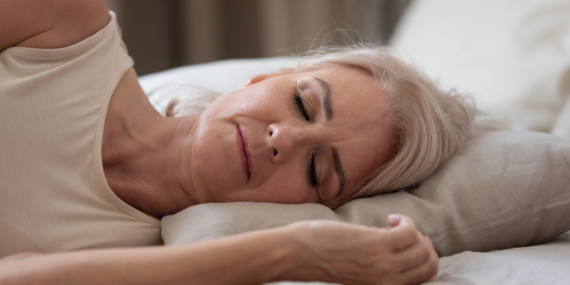 woman falling asleep - how intermittent fasting helps you sleep better - Heike Yates