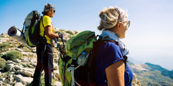 couple hiking - 5 Strategies To Plan For Your Almost Empty Nest - heike yates