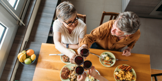 couples toasting - 5 tips to plan for an (almost) empty nest - heike yates