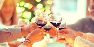 Wine glasses toasting - 5 Practical Ways To Stop Sabotaging Yourself- Heike Yates