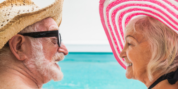 older couple wearing hats 