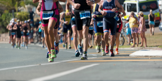 runners in a race - 5 Easy Ways To Protect Your Knees - Heike Yates
