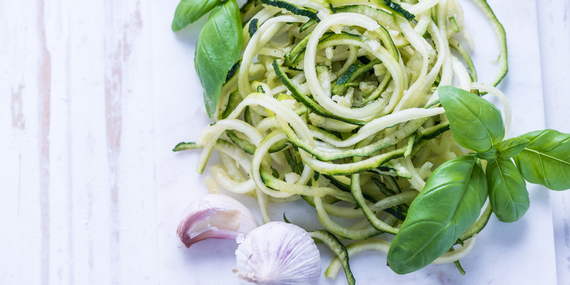 Zucchini noodles on a plate - 3 Tips To Start Eating Whole Foods Instead Of Eating Clean - Heike Yates
