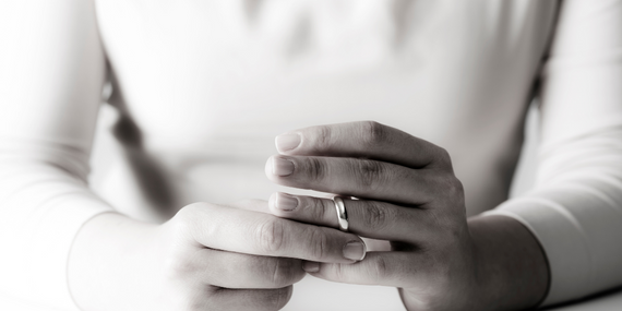 5 tips on how to rescue your empty nest marriage - woman holding wedding ring