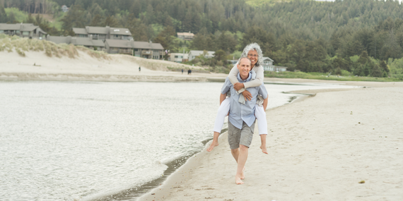 5 tips on how to rescue your empty nest marriage - couple walking on beach,  Heike Yates