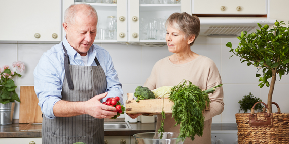 5 tips on how to rescue your empty nest marriage - couple cooking vegetables