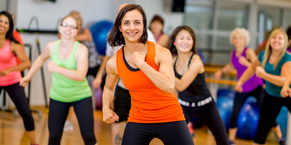 women exercising together in a class