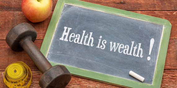 Top 5 Reasons Exercising Regularly Will Benefit Your Finances - sign say health is wealth