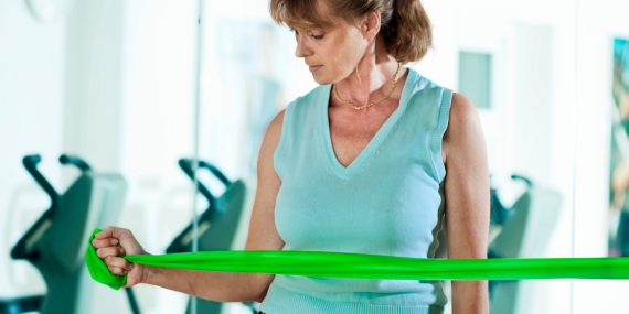  woman using resistance band