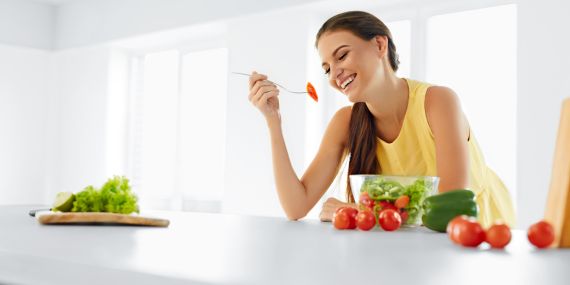5 Steps for Daily Energy and Focus In Midlife  - woman eating salad