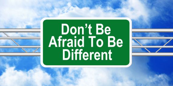 sign saying , don't be afraid to be different - 5 Practical Ways To Stop Self-Sabotaging