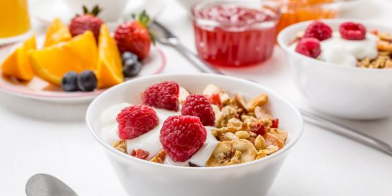 bowls with fresh fruit and cerial