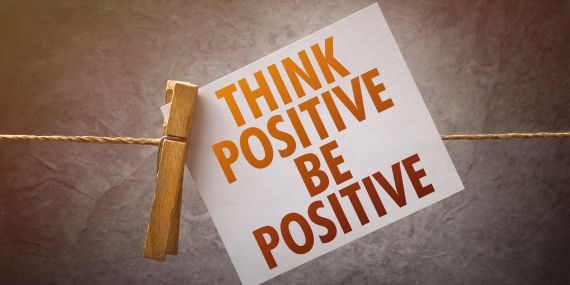 a sign saying: think positive, be positive - 6 Powerful Ways to Boost Your Midlife Wellness