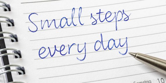 writing on a blog saying small steps every day