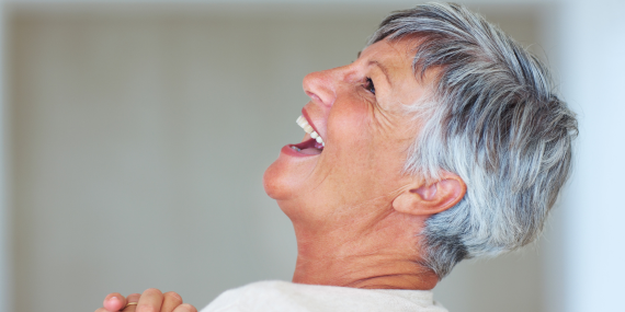 women smiling looking up. Finding Your Purpose: How to Build Confidence and Stop Feeling Invisible. power to be seen, midlife, energy,
