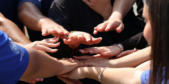 Building Consistency in Midlife: Why Speaking Up Still Leaves Women Feeling Small. women's hands over one another