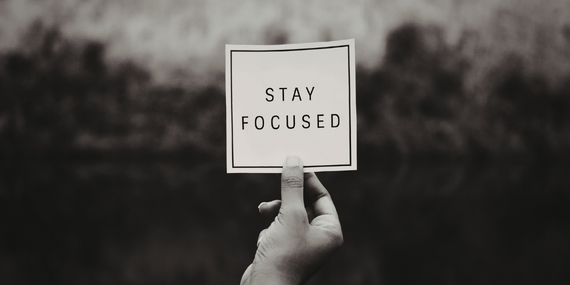 sign that says stay focused