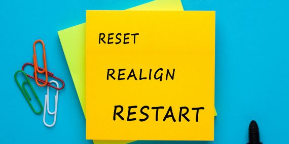 Stop starting over. A sticky note saying Reset, realign, restart. 